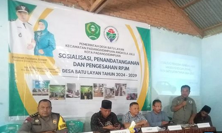 Bhabinkamtibmas BRIPKA DARWIN Dukung Pembangunan Desa Batu Layan